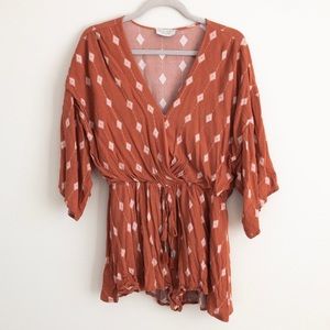 large rust colored short romper worn 1x